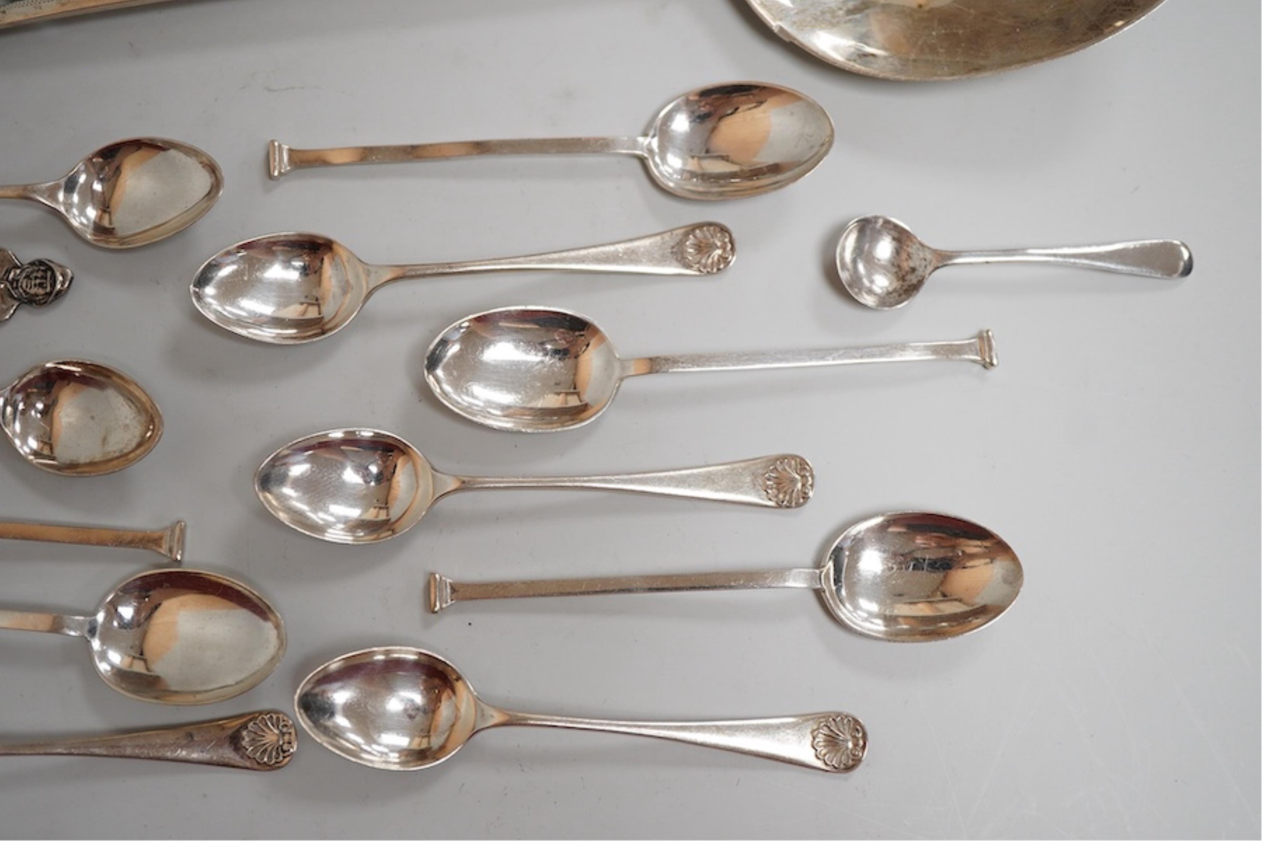 Two silver condiments and two sterling condiments, together with a set of six George V Old English and shell pattern coffee spoons by William Hutton & Sons Ltd, Sheffield, 1933, seven other items of assorted silver flatw